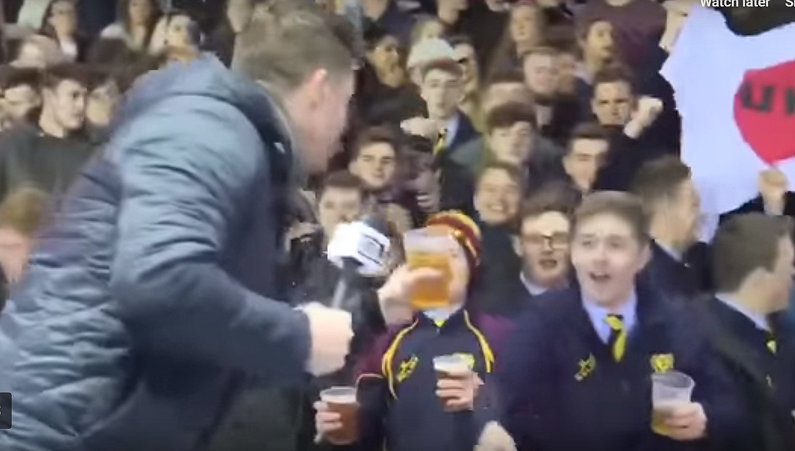 WATCH: A TV presenter is challenged by a rugby crowd, what he does next is broadcasting history